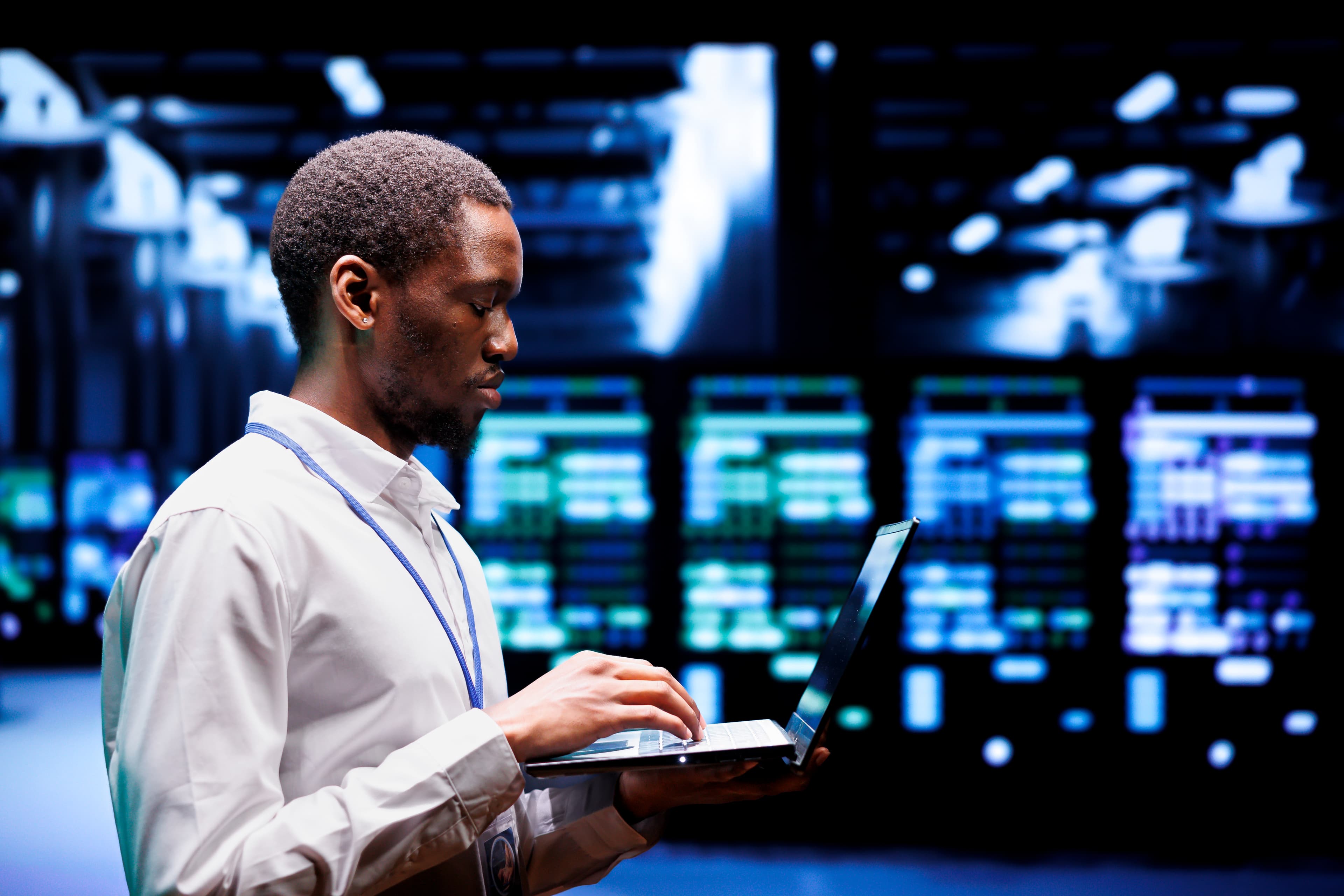 Technician working in a server room